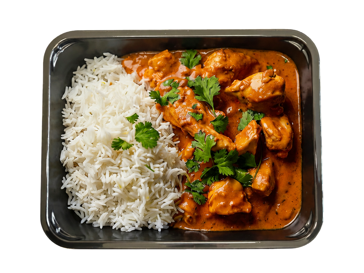 Butter chicken i cremet sauce med basmatiris og frisk koriander.
